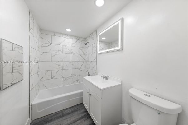 Bathroom, Interior, Marble Walls, Recessed Lighting, Wood Texture Flooring