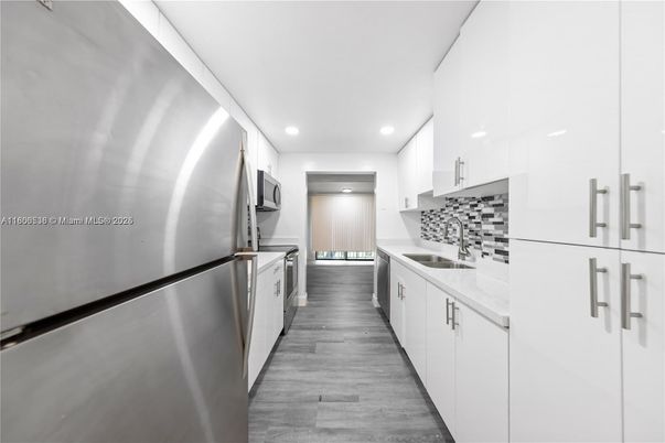 Interior, Kitchen, Recessed Lighting, Stainless Steel Appliances, Wood Texture Flooring