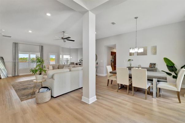 Dining room, Interior, Living room, Pendant Lights, Recessed Lighting, Wood Texture Flooring