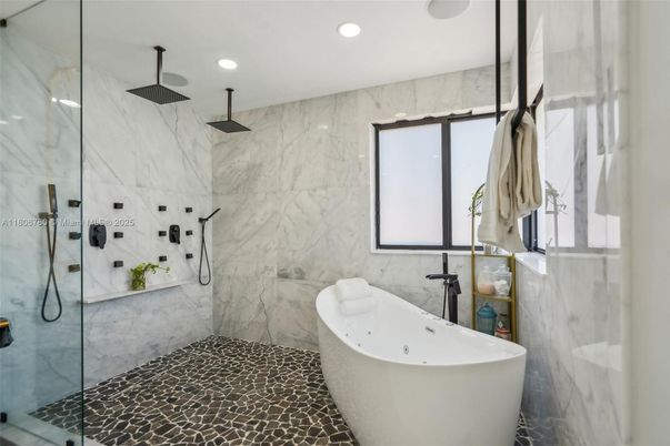 Bathroom, Free Standing Baths, Glass Shower, Interior, Marble Walls, Recessed Lighting