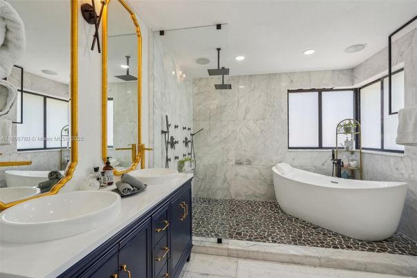 Bathroom, Dual Sink Vanities, Free Standing Baths, Glass Shower, Interior, Marble, Marble Walls, Recessed Lighting