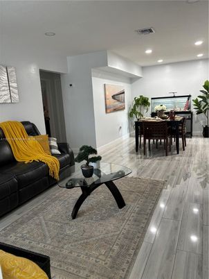 Dining room, Interior, Living room, Recessed Lighting, Water, Wood Texture Flooring