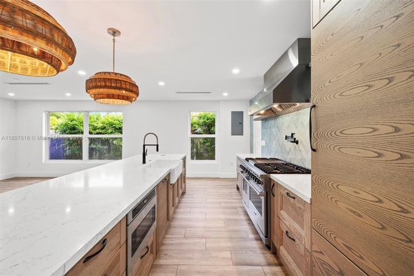 Interior, Kitchen, Pendant Lights, Recessed Lighting, Stainless Steel Appliances, Wood Texture Flooring