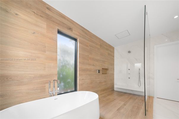 Bathroom, Free Standing Baths, Interior, Marble Walls, Recessed Lighting, Wood Texture Flooring, Wooden Walls