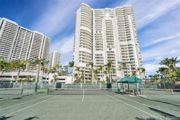 Exterior, Facade, Tennis Courts, Condo Building