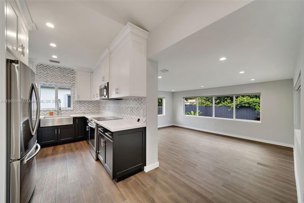 Interior, Kitchen, Recessed Lighting, Stainless Steel Appliances, Wood Texture Flooring