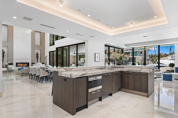Dining room, Fireplace, Interior, Kitchen, Marble, Pendant Lights, Recessed Lighting, Stainless Steel Appliances