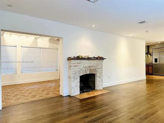 Empty room, Fireplace, Interior, Kitchen, Recessed Lighting, Wood Texture Flooring