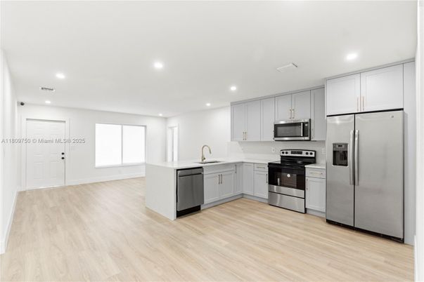 Interior, Kitchen, Recessed Lighting, Stainless Steel Appliances, Wood Texture Flooring