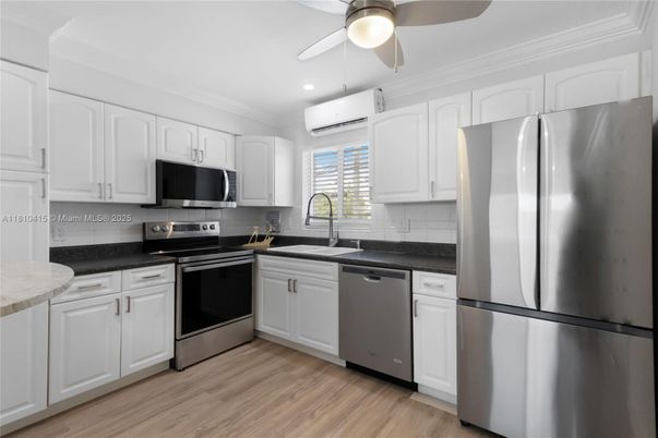 Interior, Kitchen, Recessed Lighting, Stainless Steel Appliances, Wood Texture Flooring