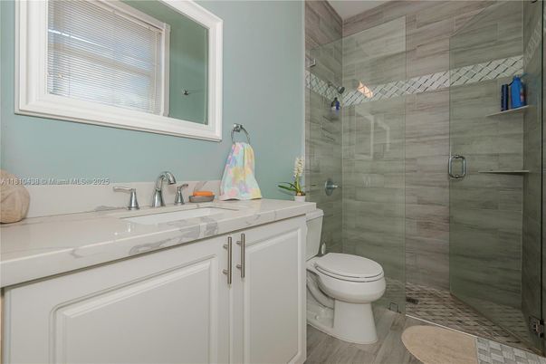 Bathroom, Glass Shower, Interior, Tile Countertops, Wood Texture Flooring