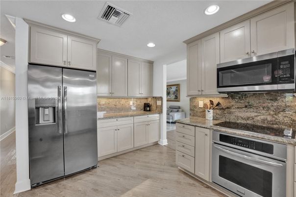 Interior, Kitchen, Recessed Lighting, Stainless Steel Appliances, Wood Texture Flooring