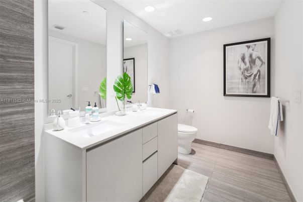 Bathroom, Dual Sink Vanities, Interior, Recessed Lighting, Wood Texture Flooring