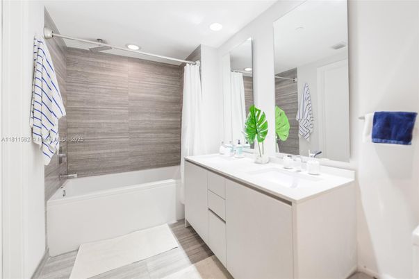 Bathroom, Dual Sink Vanities, Interior, Recessed Lighting, Wood Texture Flooring
