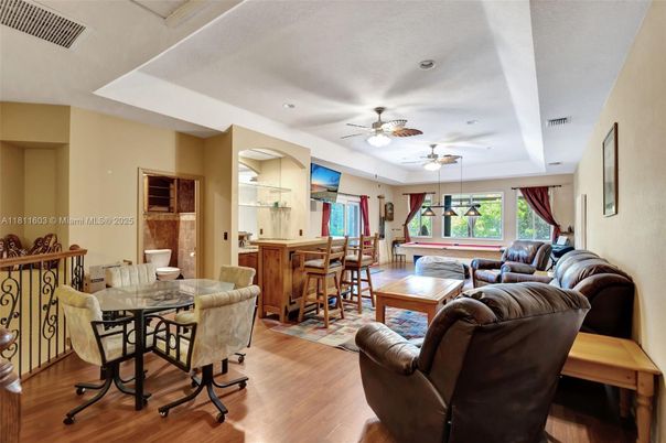 Billiard Table, Dining room, Game Room, Interior, Living room, Pendant Lights, Recessed Lighting, Wood Texture Flooring