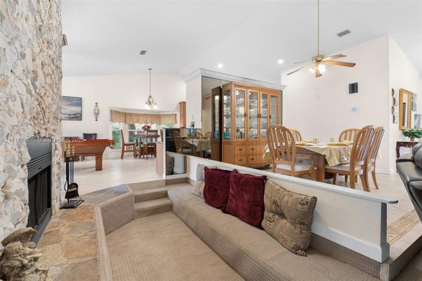 Billiard Table, Dining room, Fireplace, Interior, Living room, Pendant Lights, Recessed Lighting, Stone Walls
