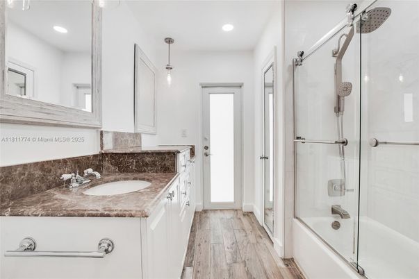 Bathroom, Glass Shower, Interior, Pendant Lights, Recessed Lighting, Wood Texture Flooring