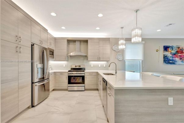 Interior, Kitchen, Marble, Pendant Lights, Recessed Lighting, Stainless Steel Appliances