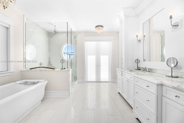 Bathroom, Dual Sink Vanities, Free Standing Baths, Glass Shower, Interior, Marble, Marble Walls, Recessed Lighting