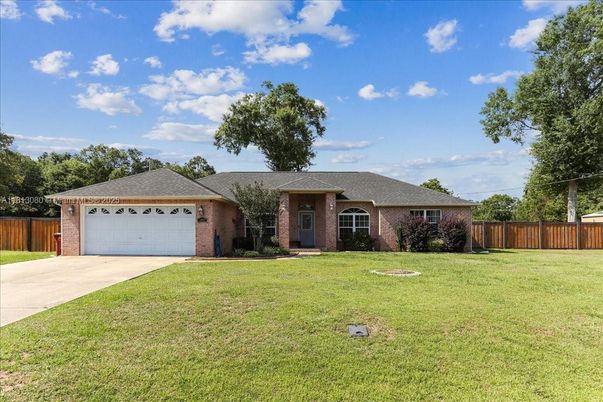 Attached, Backyard, Exterior, Facade, Brick Facade, Ranch