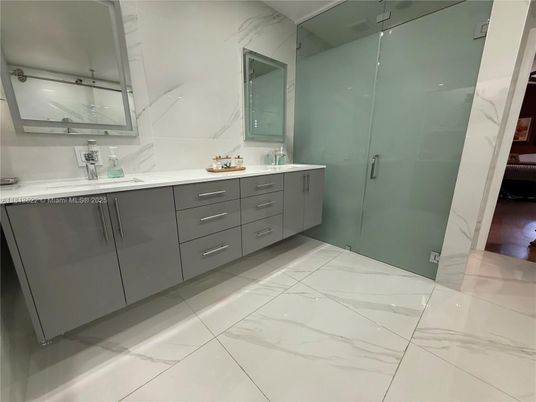 Bathroom, Dual Sink Vanities, Glass Shower, Interior, Marble, Marble Walls