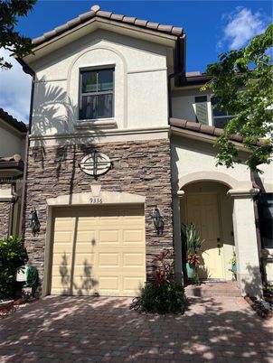 Attached, Exterior, Facade, Brick Facade, Mediterranean