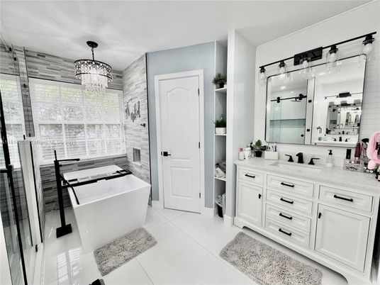Bathroom, Chandelier, Dual Sink Vanities, Free Standing Baths, Glass Shower, Interior