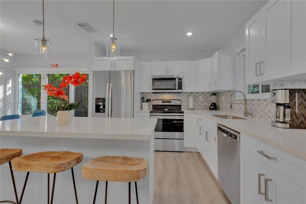 Interior, Kitchen, Pendant Lights, Recessed Lighting, Stainless Steel Appliances, Wood Texture Flooring