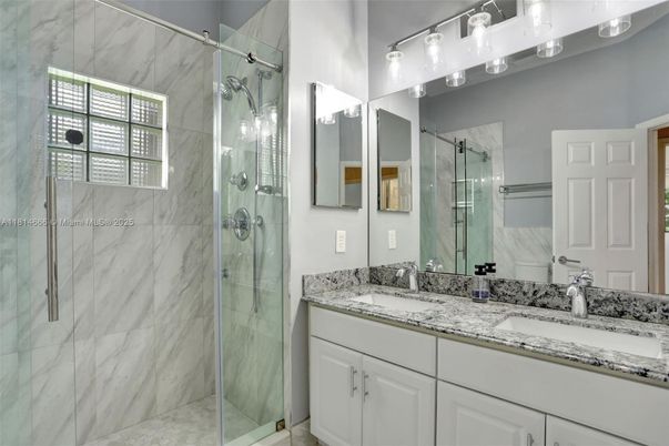 Bathroom, Dual Sink Vanities, Glass Shower, Interior, Marble Walls