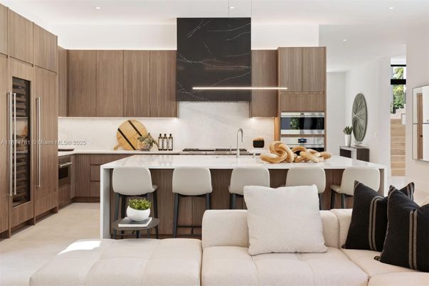 Interior, Kitchen, Marble Walls, Recessed Lighting, Stainless Steel Appliances