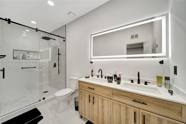 Bathroom, Dual Sink Vanities, Glass Shower, Interior, Marble, Recessed Lighting