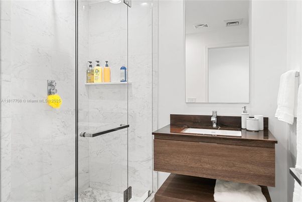 Bathroom, Glass Shower, Interior, Marble Walls, Wood Texture Flooring