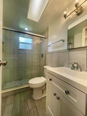 Bathroom, Glass Shower, Interior, Recessed Lighting, Wood Texture Flooring