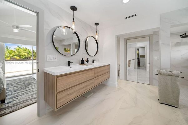 Bathroom, Dual Sink Vanities, Glass Shower, Interior, Marble, Pendant Lights, Recessed Lighting