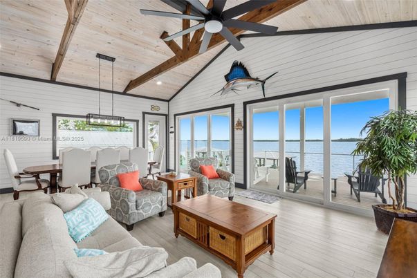 Dining room, Interior, Living room, Pendant Lights, Water, Wooden Beams, Wooden Ceilings, Wood Texture Flooring