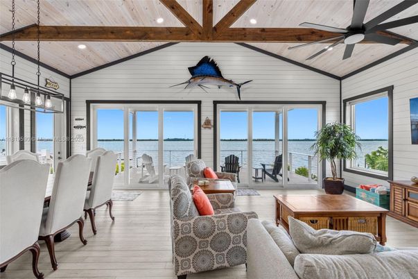 Dining room, Interior, Living room, Pendant Lights, Recessed Lighting, Water, Wooden Beams, Wood Texture Flooring