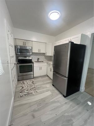 Interior, Kitchen, Stainless Steel Appliances, Wood Texture Flooring