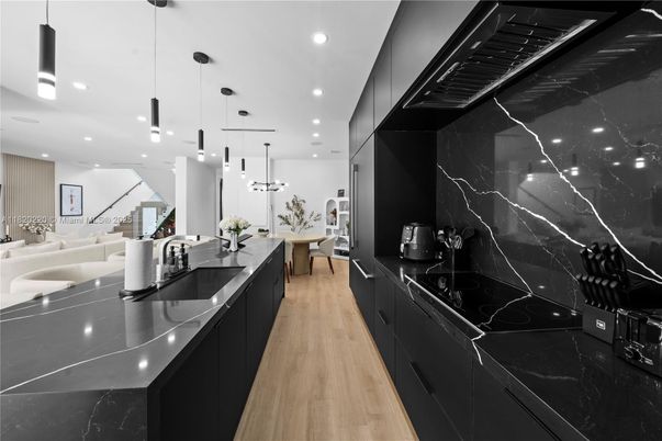 Interior, Kitchen, Marble Walls, Pendant Lights, Recessed Lighting, Wood Texture Flooring