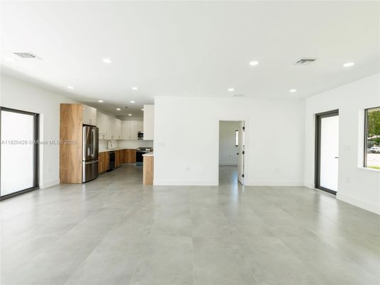 Empty room, Interior, Kitchen, Recessed Lighting, Stainless Steel Appliances