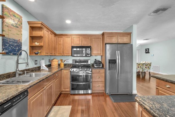Interior, Kitchen, Recessed Lighting, Stainless Steel Appliances, Wood Texture Flooring