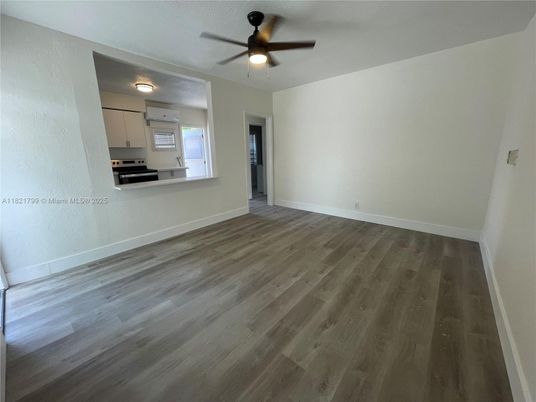 Empty room, Interior, Kitchen, Stainless Steel Appliances, Wood Texture Flooring