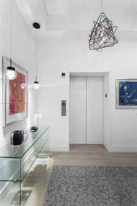Elevator, Interior, Pendant Lights, Wood Texture Flooring