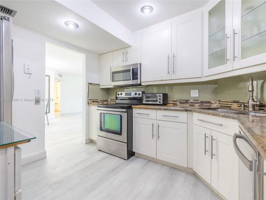 Interior, Kitchen, Recessed Lighting, Stainless Steel Appliances, Wood Texture Flooring