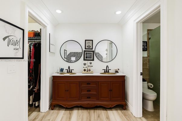 Bathroom, Dual Sink Vanities, Interior, Recessed Lighting, Wood Texture Flooring