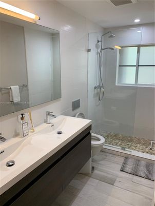 Bathroom, Dual Sink Vanities, Glass Shower, Interior, Recessed Lighting, Wood Texture Flooring