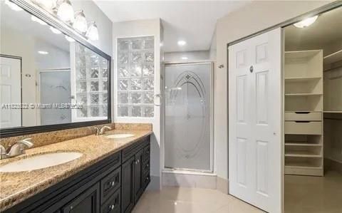 Bathroom, Dual Sink Vanities, Glass Shower, Interior, Recessed Lighting, Walk-in Closets