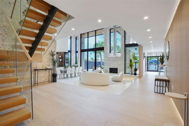 Dining room, Fireplace, Interior, Living room, Recessed Lighting, Wood Texture Flooring