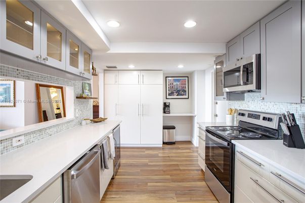 Interior, Kitchen, Recessed Lighting, Stainless Steel Appliances, Wood Texture Flooring