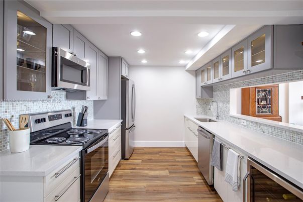 Interior, Kitchen, Recessed Lighting, Stainless Steel Appliances, Wood Texture Flooring