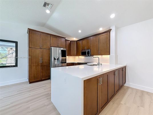 Interior, Kitchen, Recessed Lighting, Stainless Steel Appliances, Wood Texture Flooring